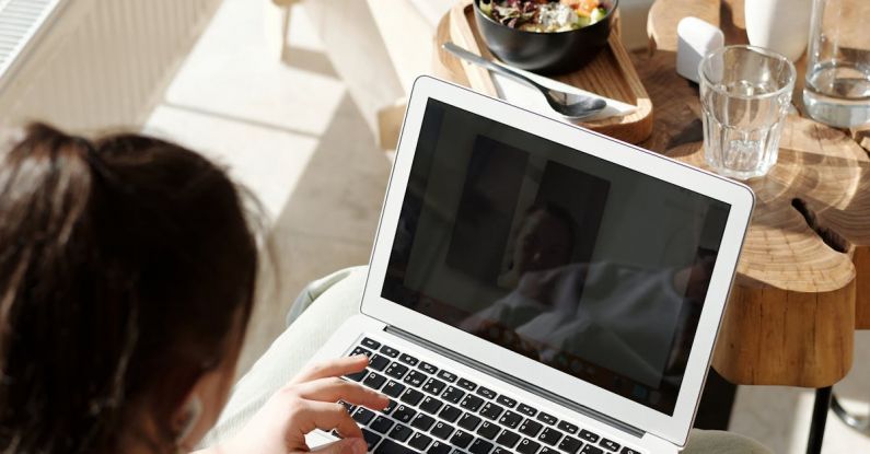 AC Portable - Woman Working at Home