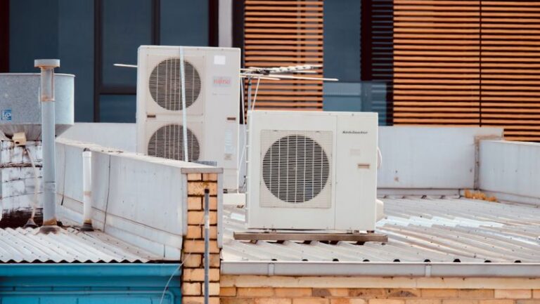 Air Conditioner - white and gray box fan on brown wooden table