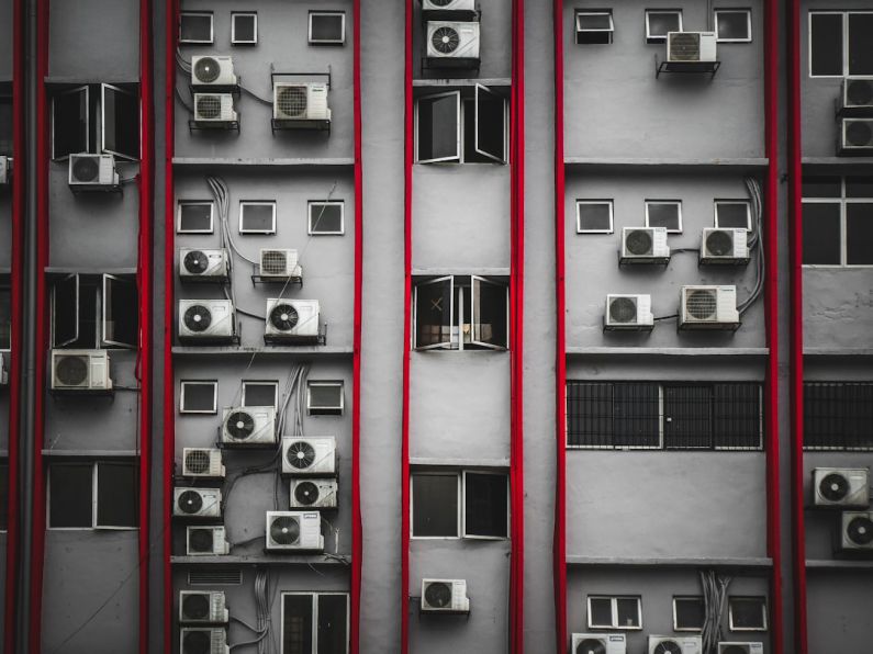 Air Conditioner - a bunch of air conditioners on a building