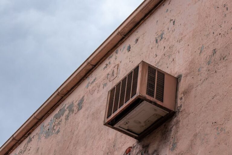 Air Conditioner - gray window-type AC unit during daytime